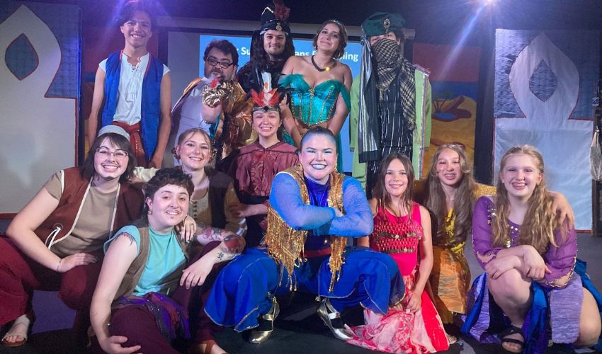 JDS Creative Academy youth performers on stage building teamwork, confidence, and communication through theater education.