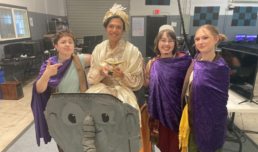 JDS Creative Academy youth performers on stage building teamwork, confidence, and communication through theater education.