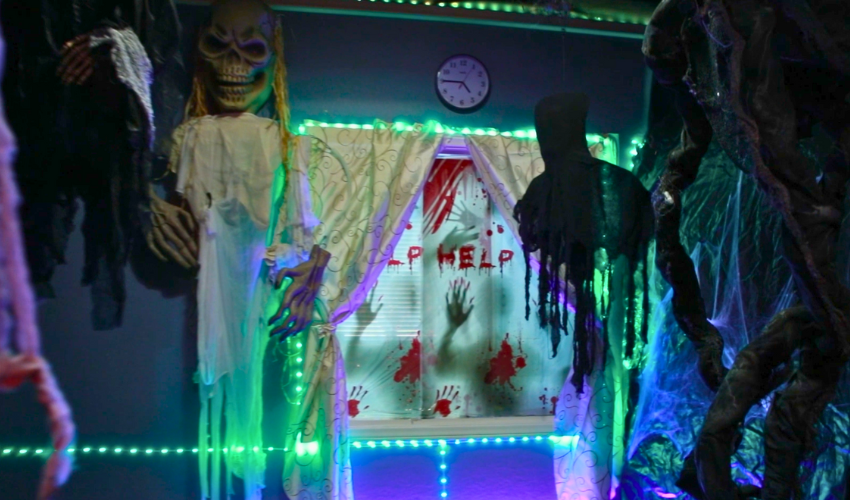 JDS Creative Academy students creating a haunted theater experience, learning lighting, sound, and storytelling skills during Halloween.
