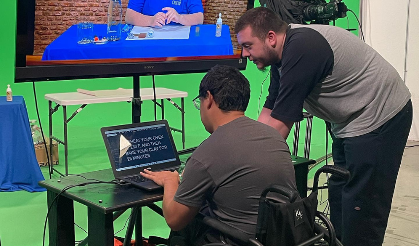 Students collaborating on a digital media project at JDS Creative Academy, learning video production and creative storytelling